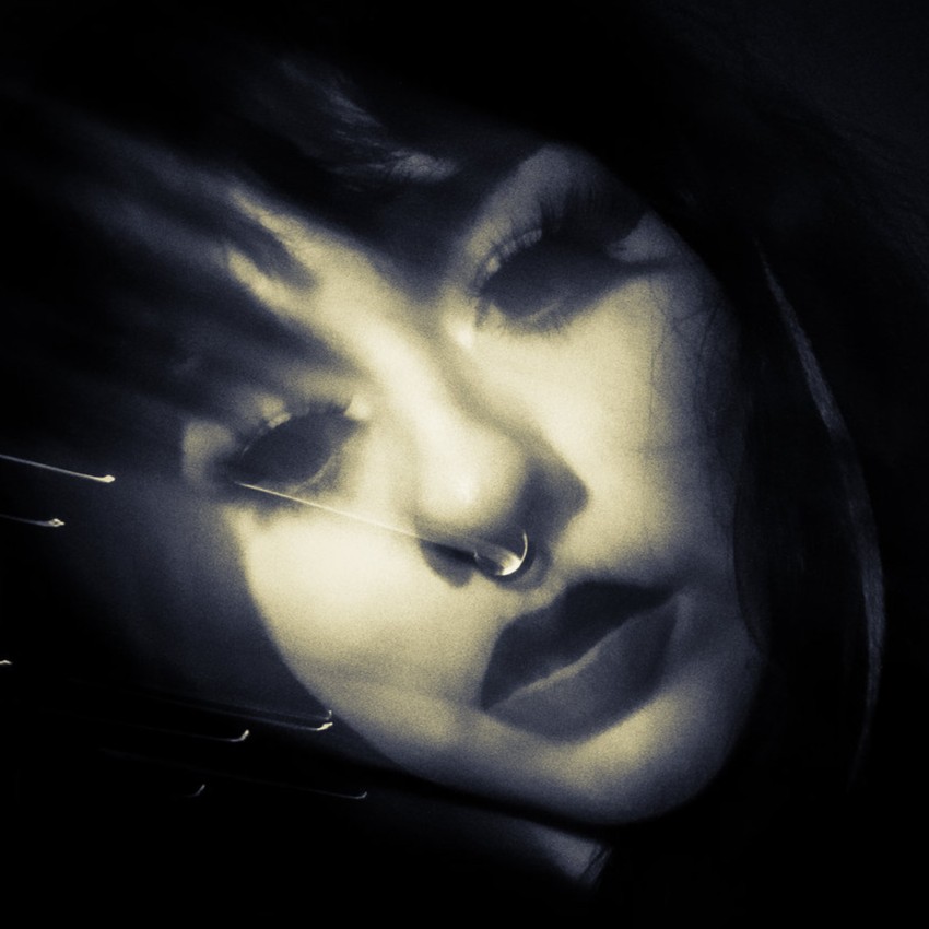 desaturated close up of Ex Lover's face with slight blur